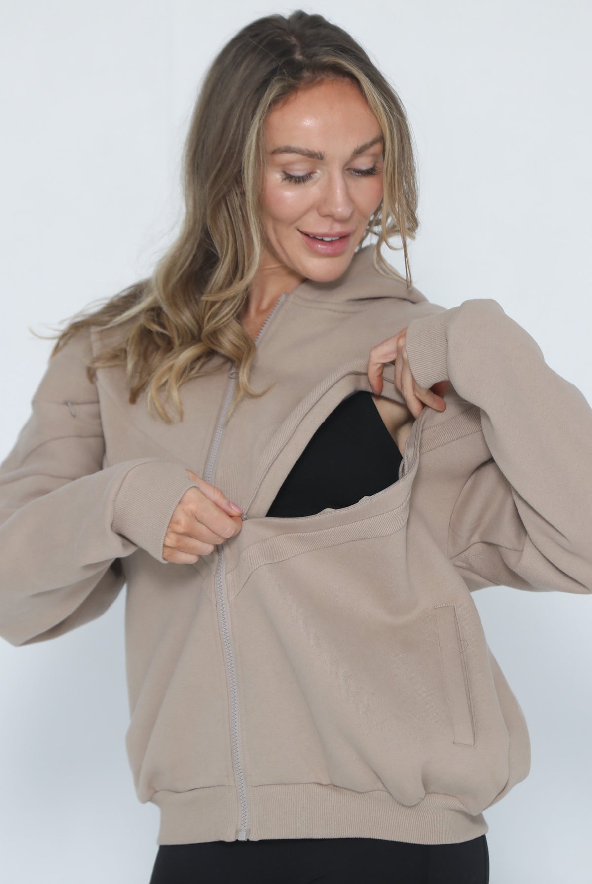 Nursing hoodie, oversized, organic cotton, invisible zipper, sweat and milk, front shot with zipper open for nursing access
