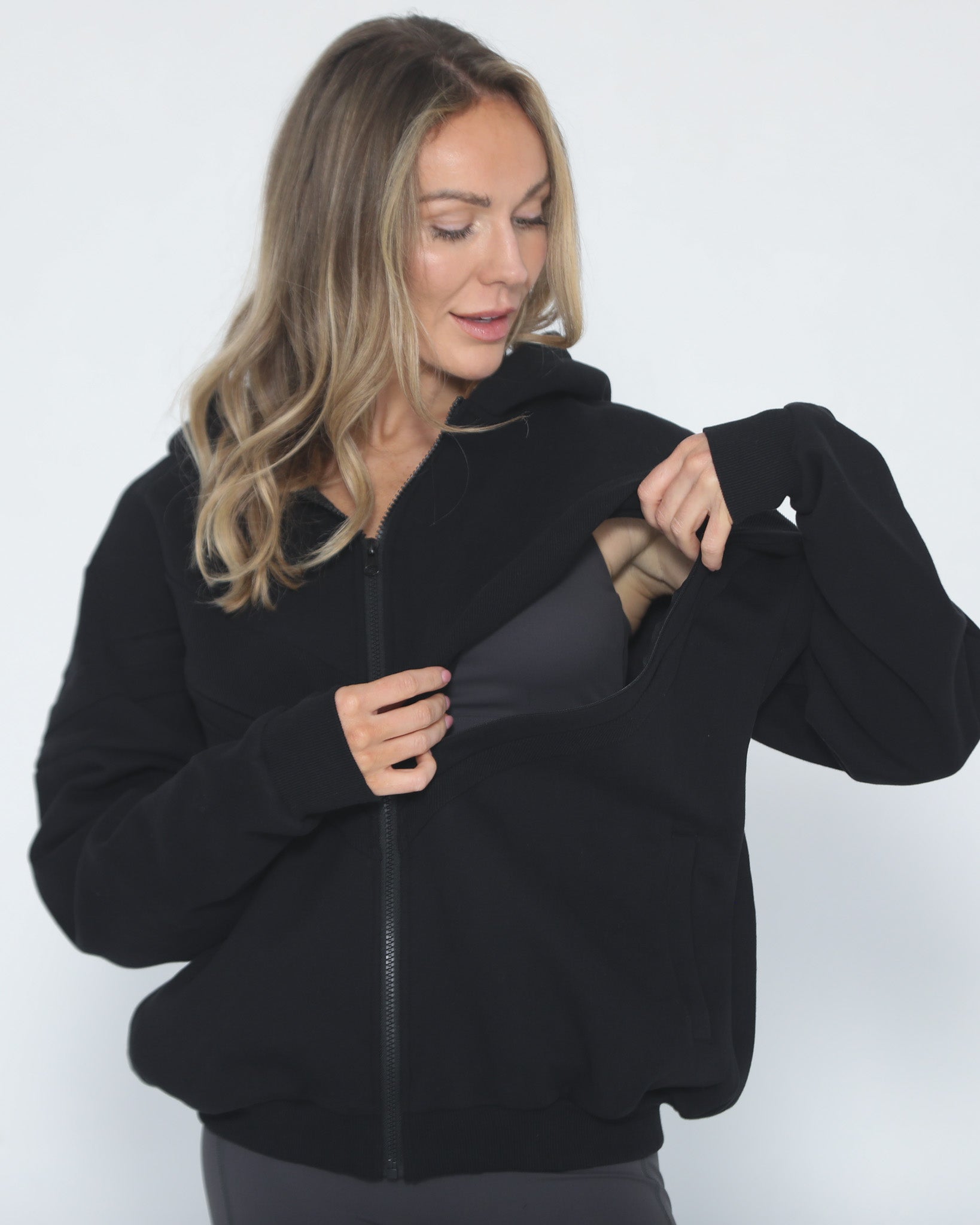 Nursing hoodie, oversized, organic cotton, invisible zipper, sweat and milk, front shot with nursing zipper open for breastfeeding access
