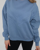 Front view of the Isabella Nursing Sweatshirt in rich chambery blue, featuring a sleek, modern silhouette and ultra-soft fabric, sweat and milk