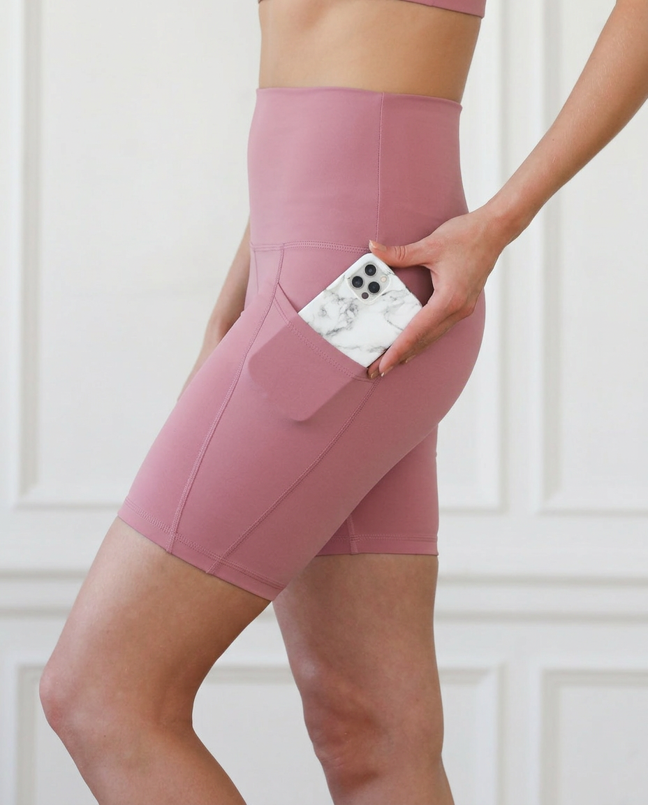 ultra high-rise postpartum biker shorts with pockets, sweat and milk, champagne rose, side shot showing pockets