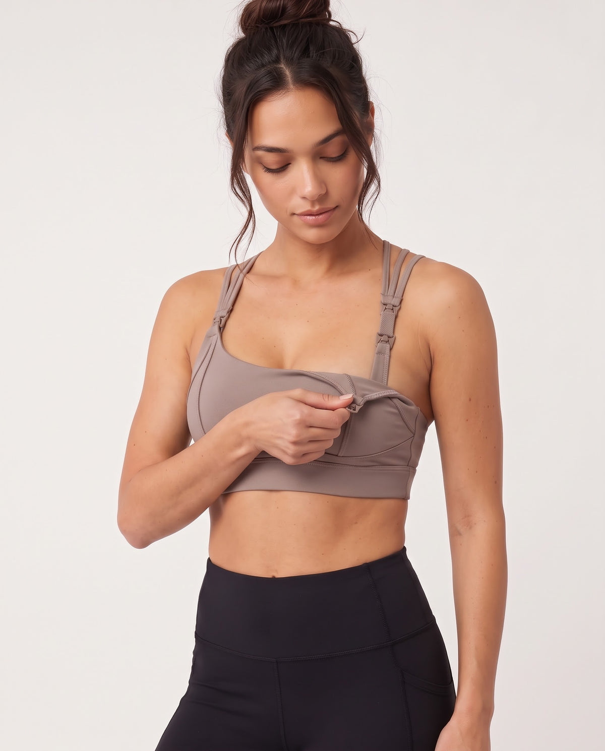 Chloe 5 running nursing sports bra with built in cups, non removable pads, high support, strappy back, adjustable band, nursing shot on model, praline