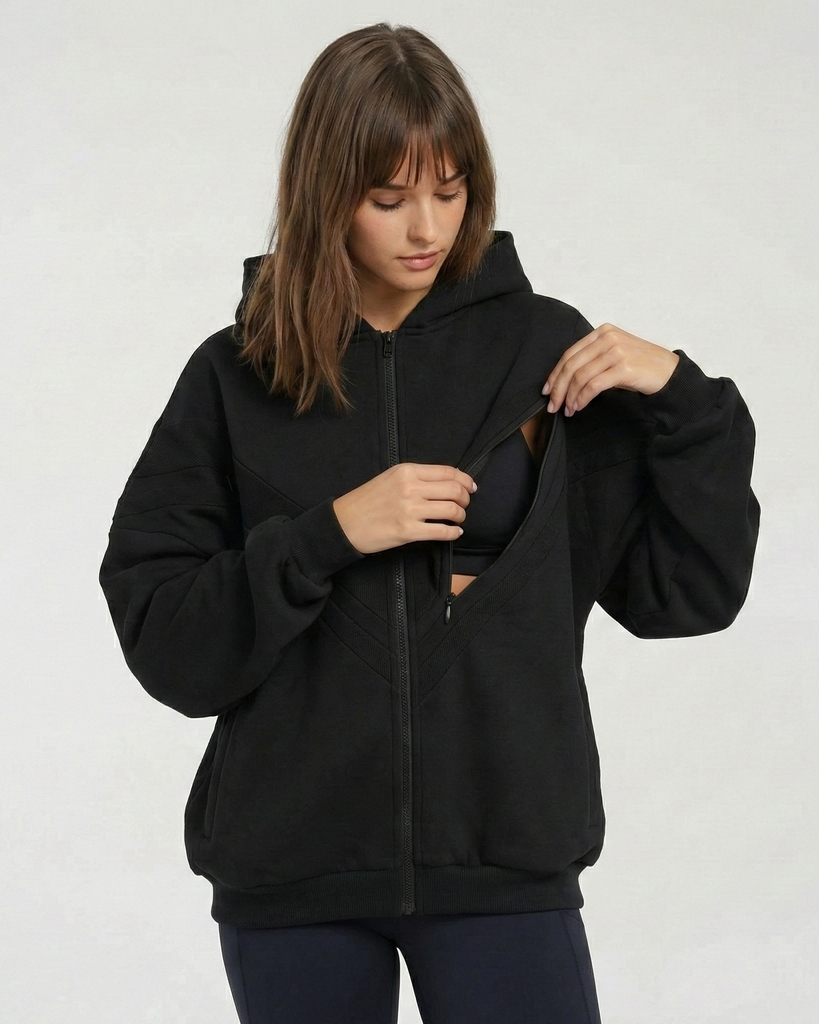 Nursing hoodie, oversized, organic cotton, invisible zipper, sweat and milk, front shot showing unzipping feature for breastfeeding