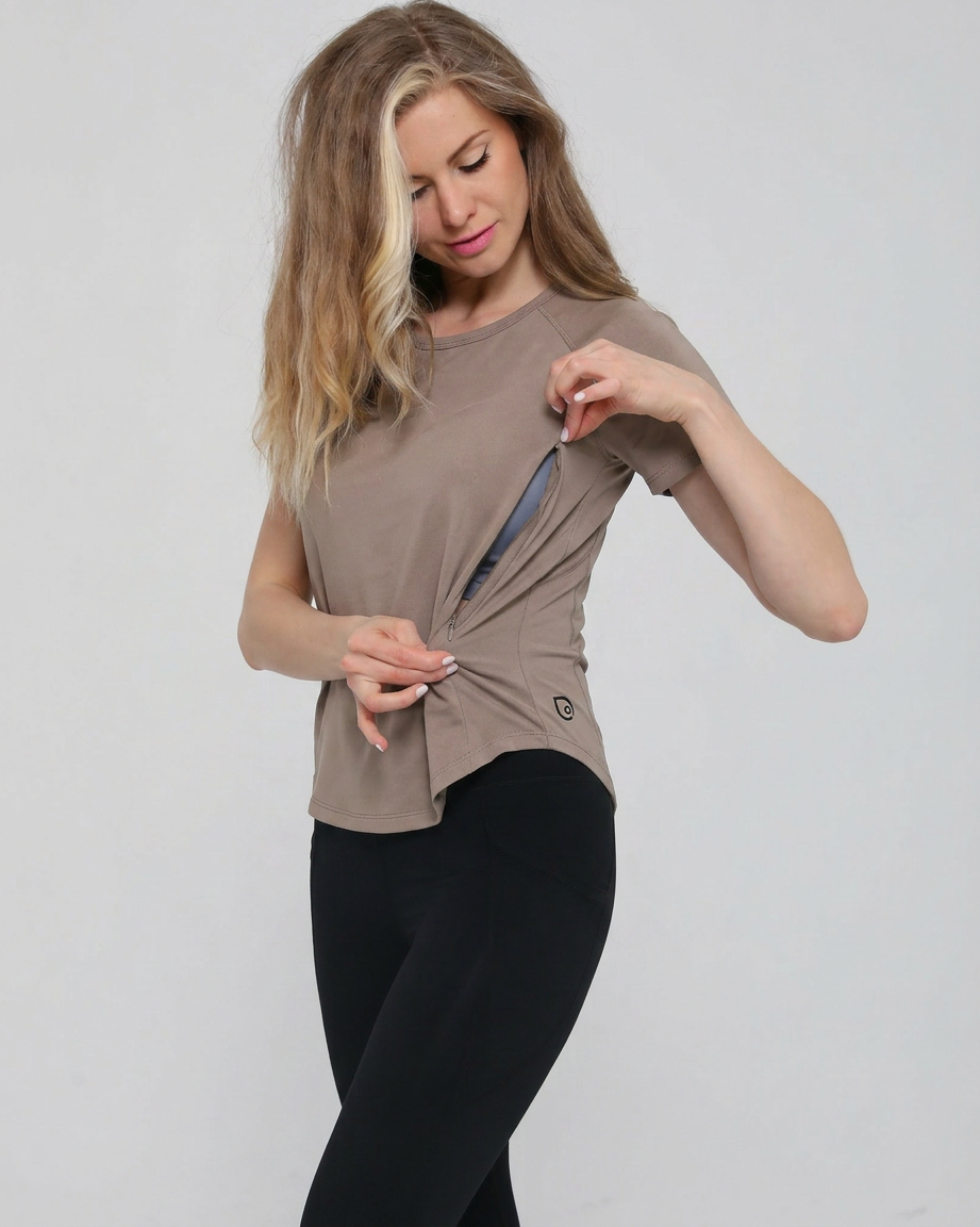 Mira running nursing top short sleeve, side shot with zipper open for nursing access, on model, dune color, sweat and milk