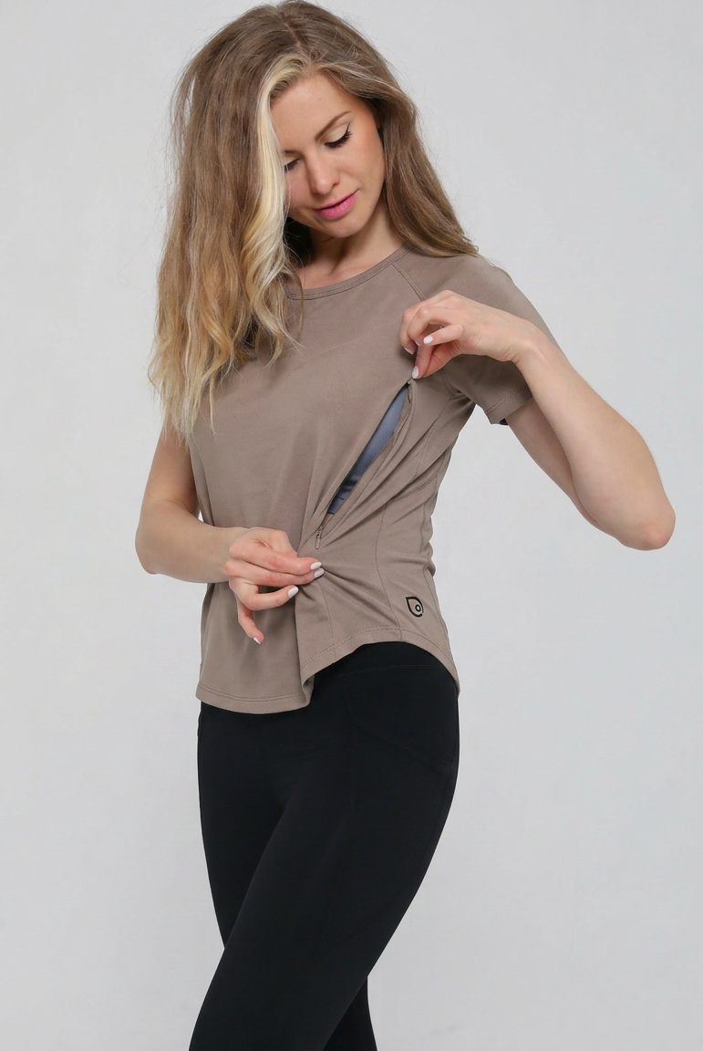 Mira running nursing top short sleeve, side shot with zipper open for nursing access, on model, dune color, sweat and milk
