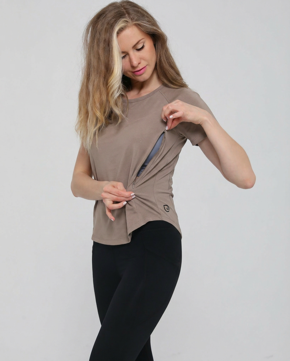 Mira running nursing top short sleeve, side shot with zipper open for nursing access, on model, dune color, sweat and milk