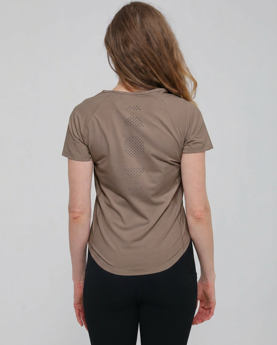Mira running nursing top short sleeve, back shot with laser cut details, on model, dune color, sweat and milk