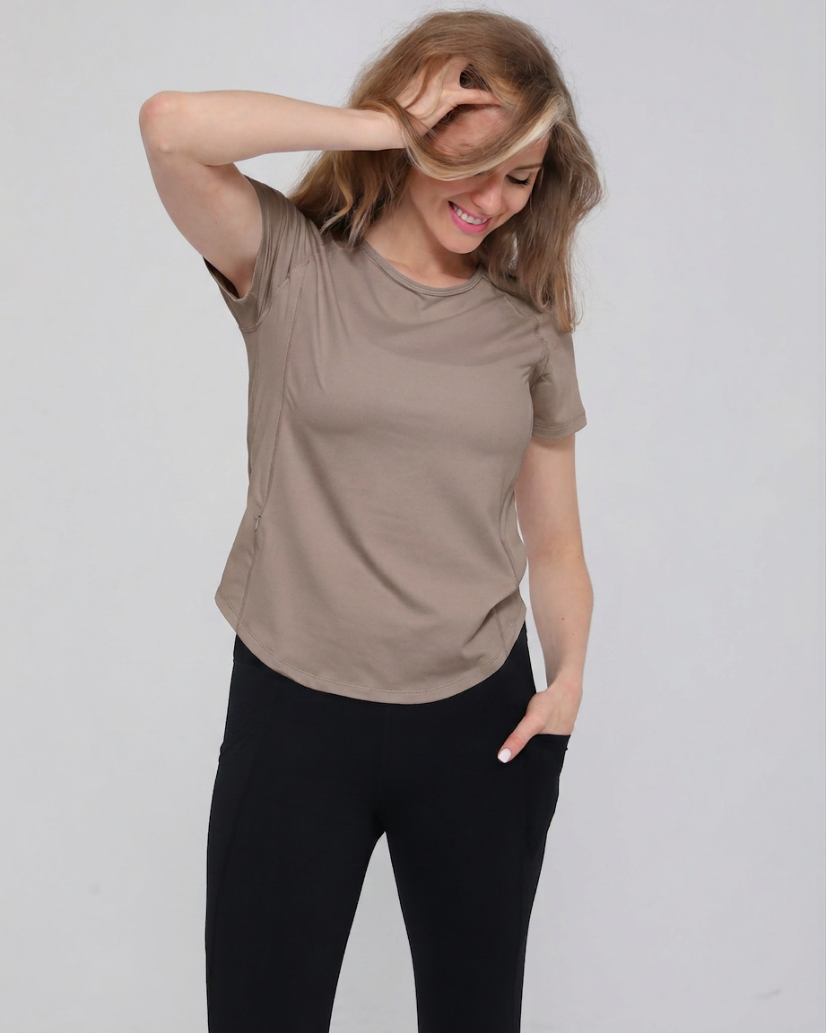 Mira running nursing top short sleeve, front shot, on model, dune color, sweat and milk