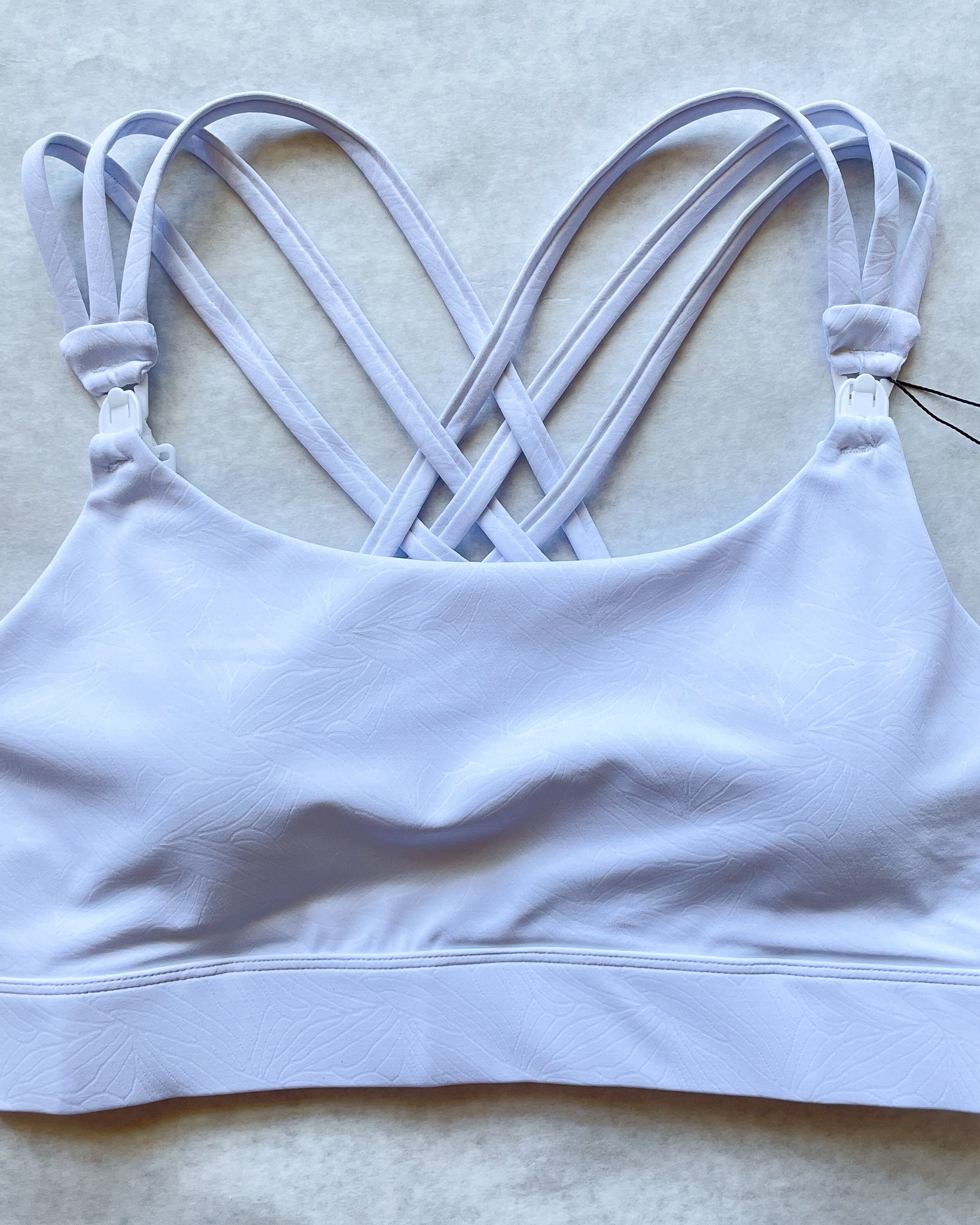 Chloe 4 Running Nursing and Pumping Sports Bra, black, strappy back, supportive, stylish, mid high impact, high coverage, supportive, large chest, white floral, sweat and milk