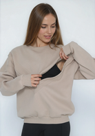 Isabella Oversized organic cotton nursing and pregnancy sweatshirt, sweat and milk, sand stone color, front shot with zipper open for breastfeeding