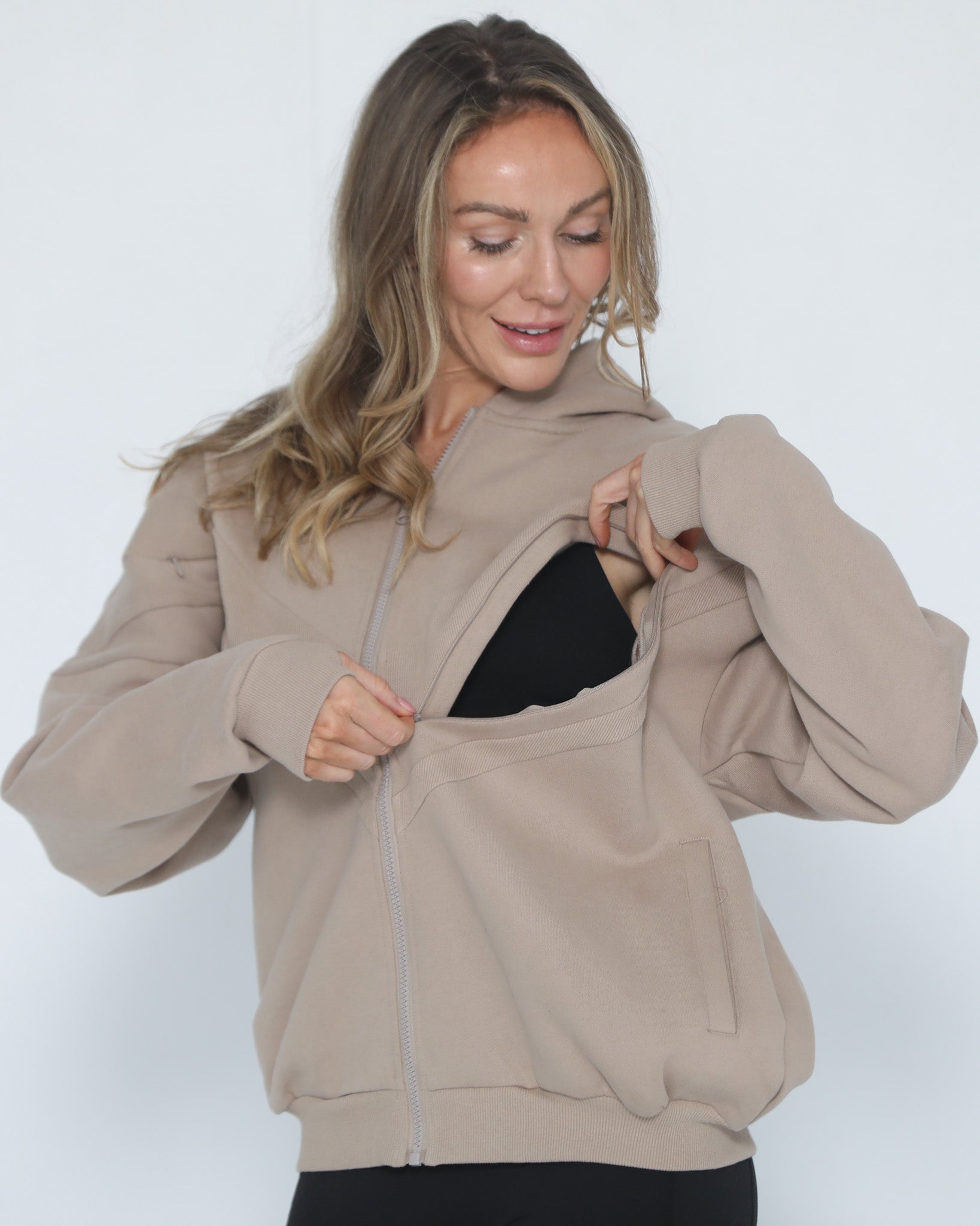 Nursing hoodie, oversized, organic cotton, invisible zipper, sweat and milk, front shot with zipper open for nursing access