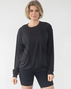 Ivy nursing top front view – relaxed fit, stylish postpartum shirt by Sweat and Milk

Model wearing Ivy top – discreet breastfeeding-friendly design
