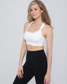 Chloe 4 nursing and pumping bra front view –  in white – Sweat and Milk