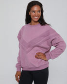 Side view of the Isabella Nursing Sweatshirt in mulberry, highlighting the flattering drape and relaxed fit. Sweat and Milk