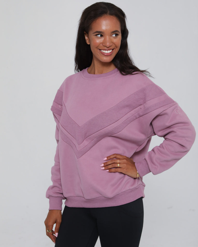 Side view of the Isabella Nursing Sweatshirt in mulberry, highlighting the flattering drape and relaxed fit. Sweat and Milk