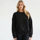 Isabella oversized nursing sweatshirt in organic cotton, front short on a model, sweat and milk