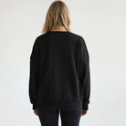 Isabella oversized nursing sweatshirt in organic cotton, back short on a model, sweat and milk