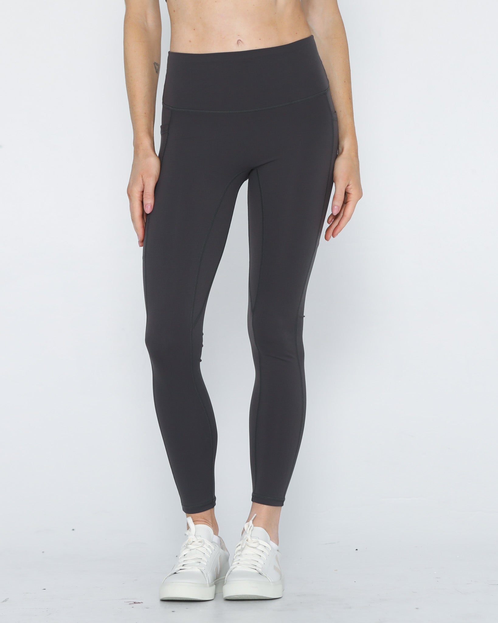 postpartum tummy control ultra high waisted leggings with pockets, front shot half body, sweat and milk