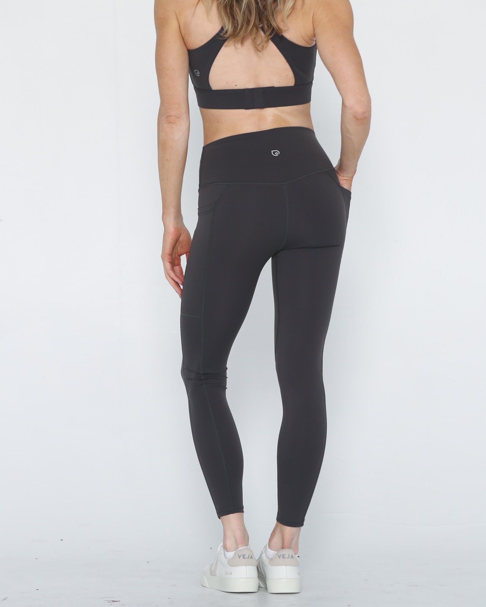 postpartum tummy control ultra high waisted leggings with pockets, back shot half body, sweat and milk