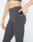 postpartum tummy control ultra high waisted leggings with pockets, side shot showing the pocket, sweat and milk