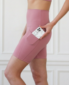 ultra high-rise postpartum biker shorts with pockets, sweat and milk, champagne rose, side shot showing pockets