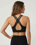 Chloe 5 running nursing sports bra with built in cups, non removable pads, high support, strappy back, adjustable band, front shot on model, back