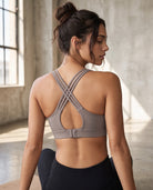 Chloe 5 running nursing sports bra with built in cups, non removable pads, high support, strappy back, adjustable band, back shot on model, praline