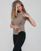 Mira running nursing top short sleeve, side shot with zipper open for nursing access, on model, dune color, sweat and milk 