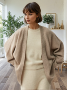 Cashmere cardigan on model, front shot, sweat and milk